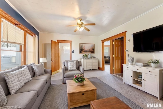 110 NW 3rd Ave, Aledo, IL 61231 - living area featuring crown molding, ceiling fan, and light colored carpet