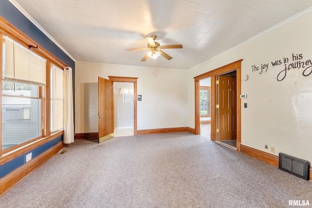 110 NW 3rd Ave, Aledo, IL 61231 - carpeted spare room featuring ornamental molding, a ceiling fan, baseboards, and cooling unit