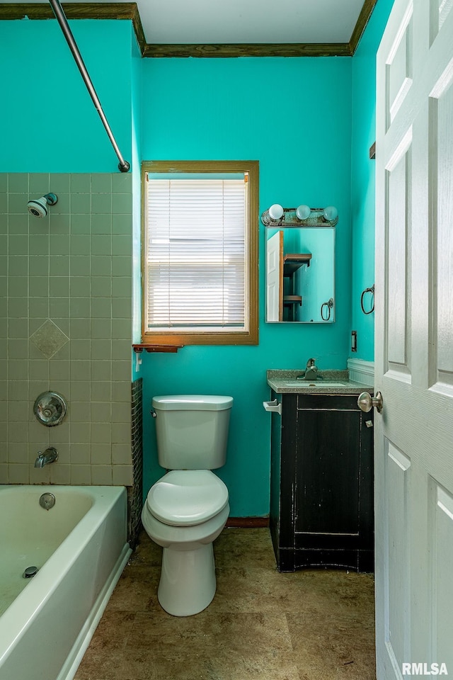 2721 11th Ave Unit B, Moline, IL 61265 - full bath featuring toilet, vanity, bathing tub / shower combination, and baseboards