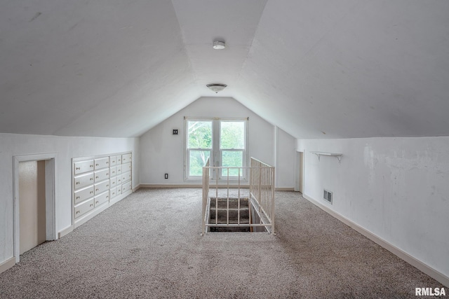 2721 11th Ave Unit B, Moline, IL 61265 - bonus room with carpet flooring, lofted ceiling, and baseboards