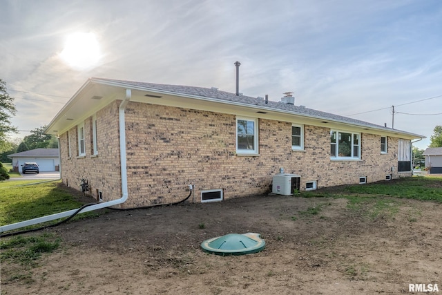 8501 49th St, Coal Valley, IL 61240 - back of house with brick siding and central AC