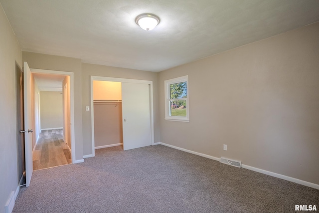 8501 49th St, Coal Valley, IL 61240 - unfurnished bedroom with carpet floors, baseboards, and a closet