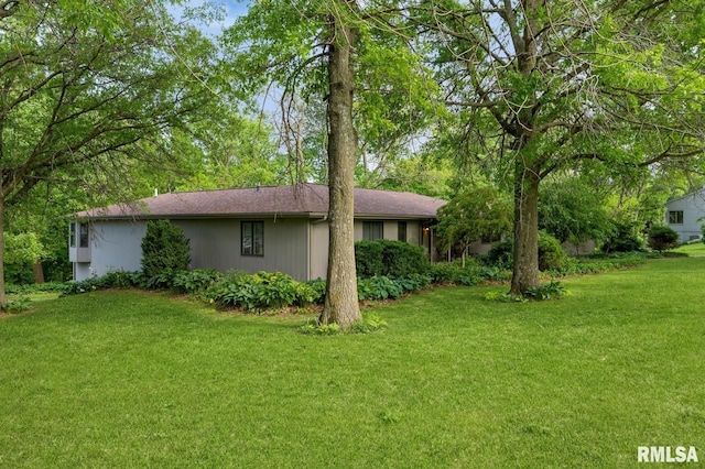 28009 230th St, Le Claire, IA 52753 - view of front facade with a front yard