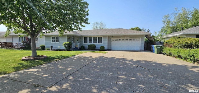 1238 8th Ave N, Clinton, IA 52732 - ranch-style home with an attached garage, driveway, and a front lawn