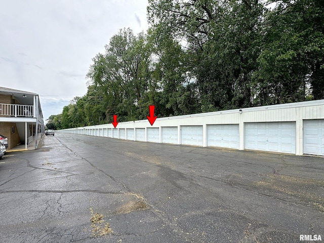 1104 Kimberly Rd Unit 1110, Bettendorf, IA 52722 - view of street featuring community garages
