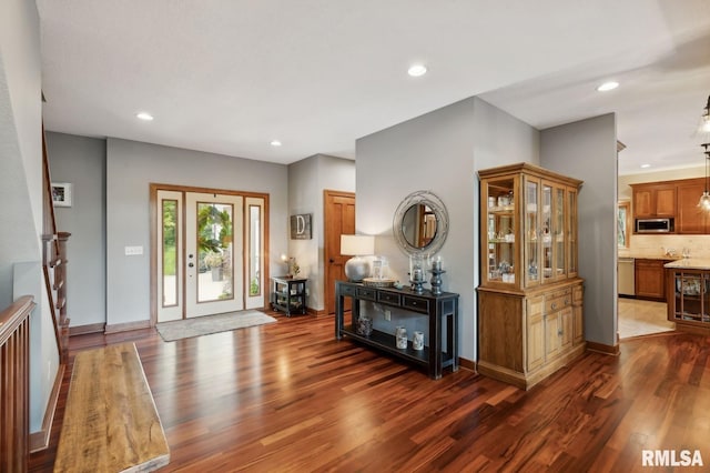 27998 229th St, Le Claire, IA 52753 - entryway featuring dark wood-style flooring, recessed lighting, and baseboards