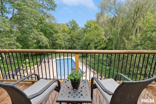 27998 229th St, Le Claire, IA 52753 - balcony featuring view of pool