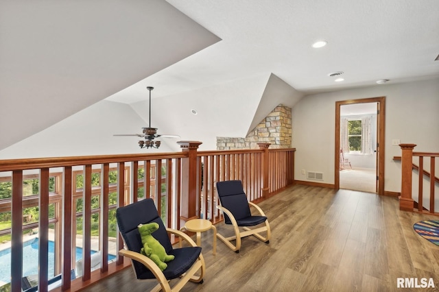 27998 229th St, Le Claire, IA 52753 - sitting room featuring lofted ceiling, ceiling fan, wood finished floors, recessed lighting, and baseboards