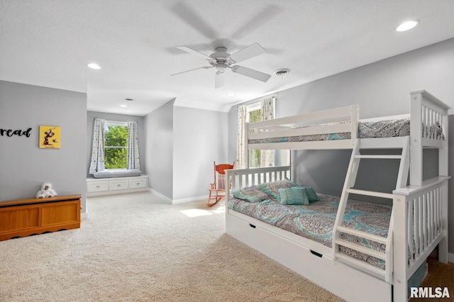 27998 229th St, Le Claire, IA 52753 - bedroom with carpet, baseboards, recessed lighting, and a ceiling fan