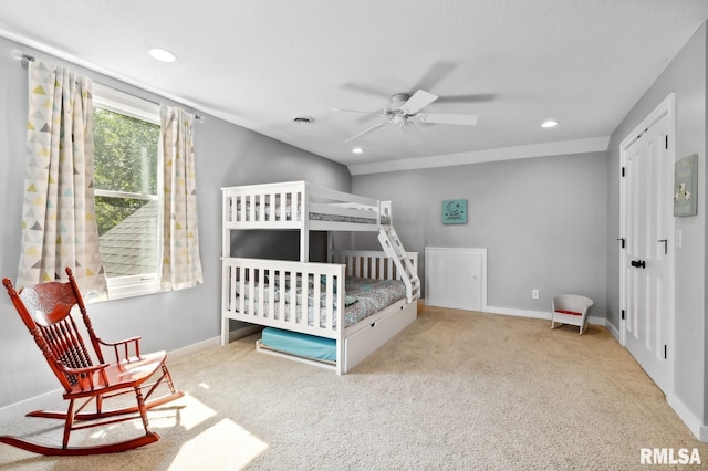 27998 229th St, Le Claire, IA 52753 - bedroom with carpet flooring, recessed lighting, baseboards, and ceiling fan