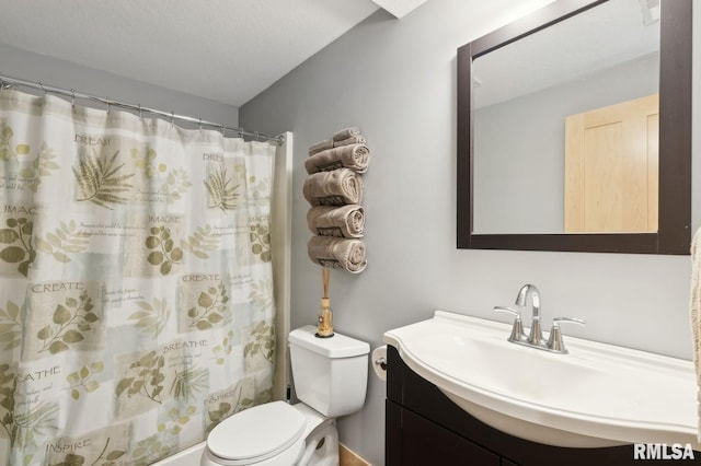 27998 229th St, Le Claire, IA 52753 - full bathroom featuring toilet, vanity, and a shower with curtain