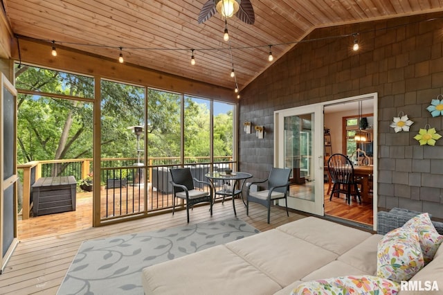 27998 229th St, Le Claire, IA 52753 - sunroom / solarium with plenty of natural light, track lighting, outdoor lounge area, vaulted ceiling, and ceiling fan