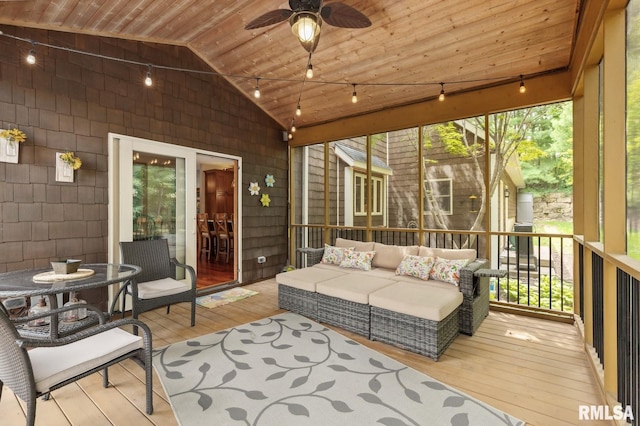27998 229th St, Le Claire, IA 52753 - sunroom with ceiling fan, lofted ceiling, and an outdoor living space