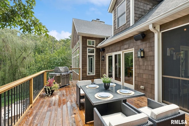 27998 229th St, Le Claire, IA 52753 - wooden terrace featuring area for grilling and outdoor dining area