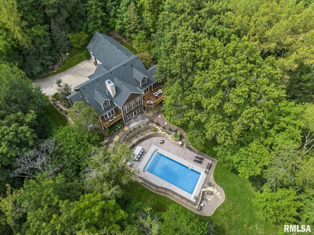 27998 229th St, Le Claire, IA 52753 - view of subject property with a pool area and a heavily wooded area