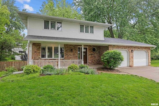 2535 E Dale Ct, Bettendorf, IA 52722 - traditional-style home featuring a porch, concrete driveway, a garage, and brick siding