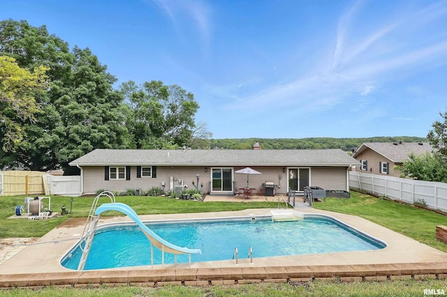 21704 283rd Ave, Le Claire, IA 52753 - view of swimming pool with a water slide and a patio area
