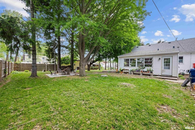 3610 12th Ave, Moline, IL 61265 - view of yard with a patio and an outdoor fire pit