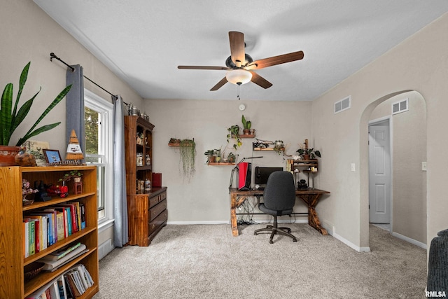 3610 12th Ave, Moline, IL 61265 - office featuring arched walkways, carpet, a ceiling fan, and baseboards