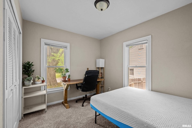 3610 12th Ave, Moline, IL 61265 - bedroom featuring carpet, a desk, and baseboards