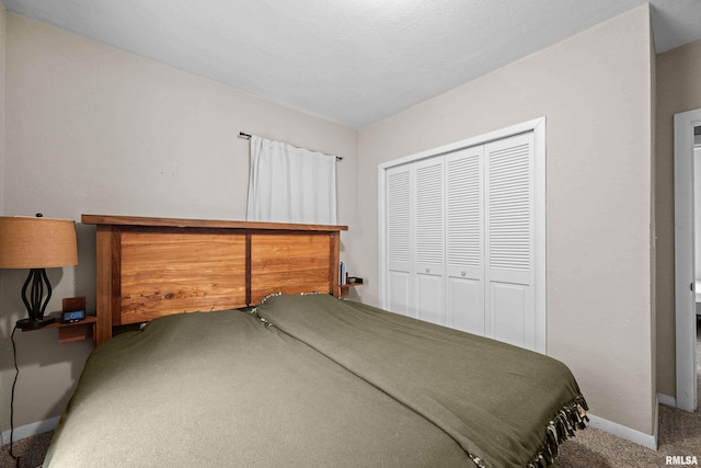 3610 12th Ave, Moline, IL 61265 - bedroom featuring carpet, baseboards, and a closet
