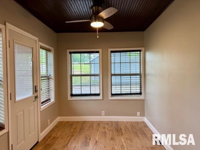 1203 13th Ave S, Clinton, IA 52732 - entryway with light wood-style floors, a ceiling fan, baseboards, and wooden ceiling