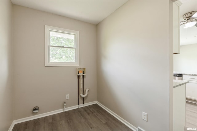 301 5th St, Matherville, IL 61263 - laundry room with hookup for a washing machine, dark wood-style flooring, baseboards, a ceiling fan, and electric dryer hookup
