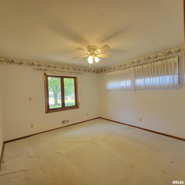 2727 32nd Avenue Ct, Rock Island, IL 61201 - spare room with ceiling fan, carpet floors, and baseboards