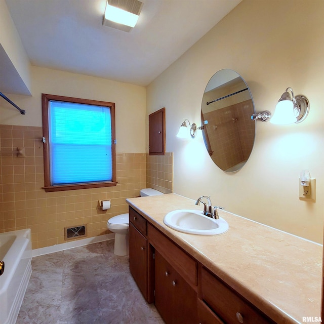 2727 32nd Avenue Ct, Rock Island, IL 61201 - bathroom featuring tile walls, vanity, toilet, shower / tub combination, and a wainscoted wall