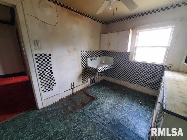 2327 7th St, Rock Island, IL 61201 - empty room featuring ceiling fan