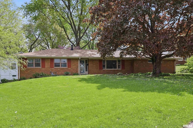 2521 Jersey Ridge Rd, Davenport, IA 52803 - single story home featuring brick siding and a front yard