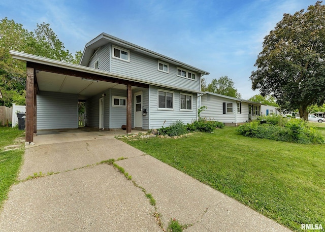 2908 N 4th St, Clinton, IA 52732 - view of front of house with driveway, a front lawn, and an attached carport