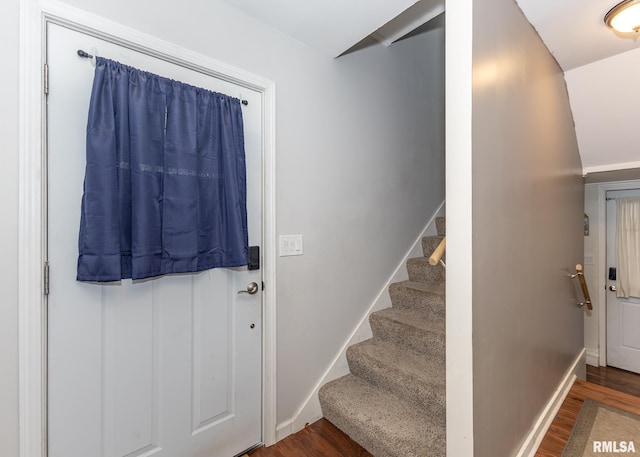 2908 N 4th St, Clinton, IA 52732 - entryway featuring wood finished floors, stairs, and baseboards
