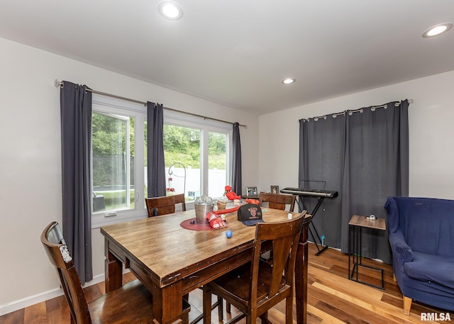 2908 N 4th St, Clinton, IA 52732 - dining room with wood finished floors, recessed lighting, and baseboards