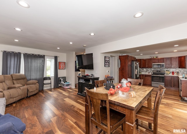 2908 N 4th St, Clinton, IA 52732 - dining area featuring light wood-style flooring and recessed lighting