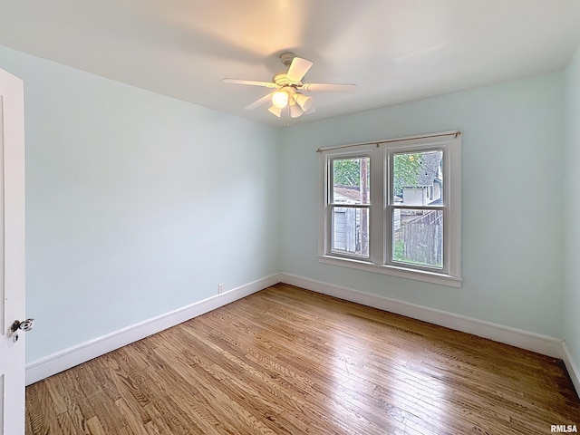 308 E Central Park Ave, Davenport, IA 52803 - empty room with light wood-style floors, baseboards, and a ceiling fan