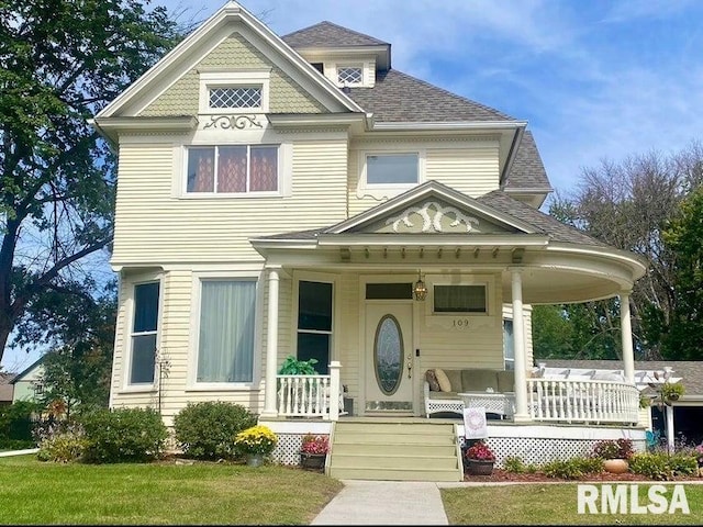 109 W 6th St, Wilton, IA 52778 - victorian home featuring covered porch and a shingled roof