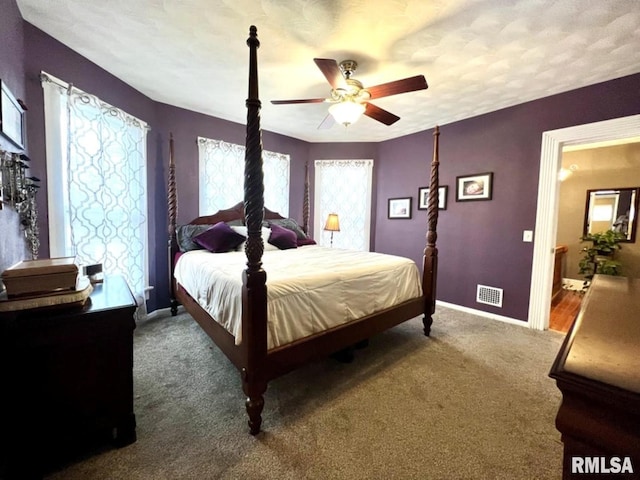 109 W 6th St, Wilton, IA 52778 - bedroom featuring carpet flooring, baseboards, and ceiling fan