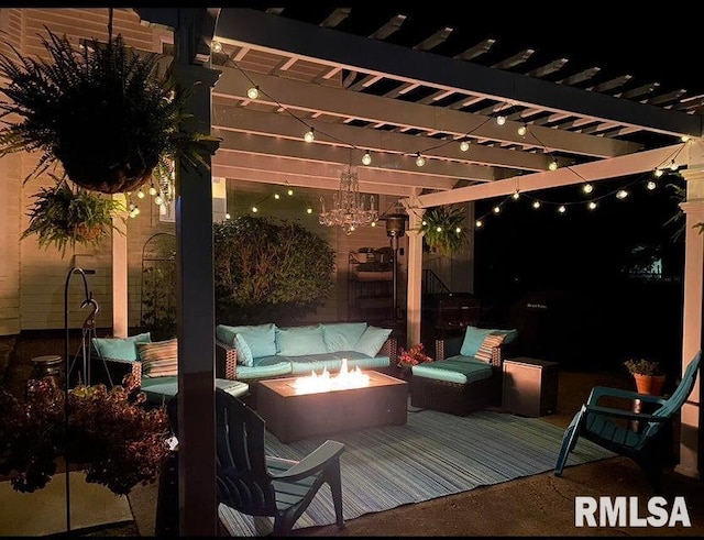 109 W 6th St, Wilton, IA 52778 - deck at night with an outdoor fire pit and a pergola