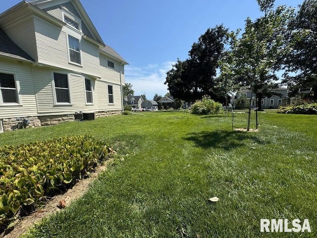 109 W 6th St, Wilton, IA 52778 - view of green lawn featuring cooling unit