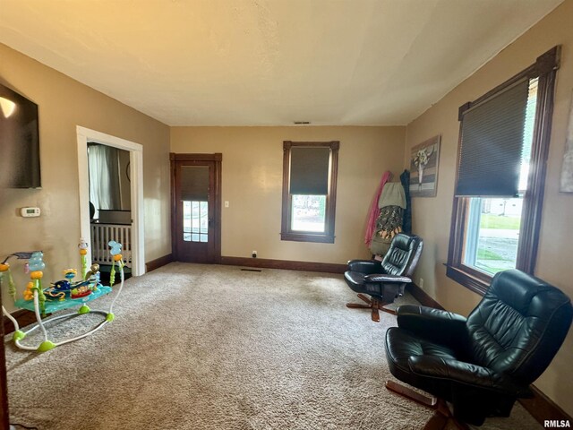 111 NE 5th St, Aledo, IL 61231 - bungalow with an outdoor structure, a detached garage, a front lawn, entry steps, and a chimney
