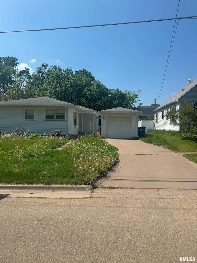 407 16th Ave N, Clinton, IA 52732 - ranch-style house featuring concrete driveway and a garage