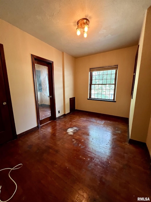 3752 12th St, Rock Island, IL 61201 - unfurnished room with wood finished floors and baseboards