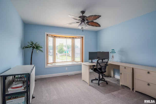 6939 Cresthill Dr, Davenport, IA 52806 - home office with carpet floors, a ceiling fan, and baseboards