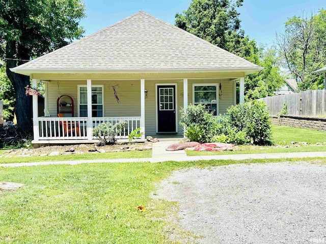 610 E Illinois Ave, Carterville, IL 62918 - bungalow featuring covered porch and roof with shingles