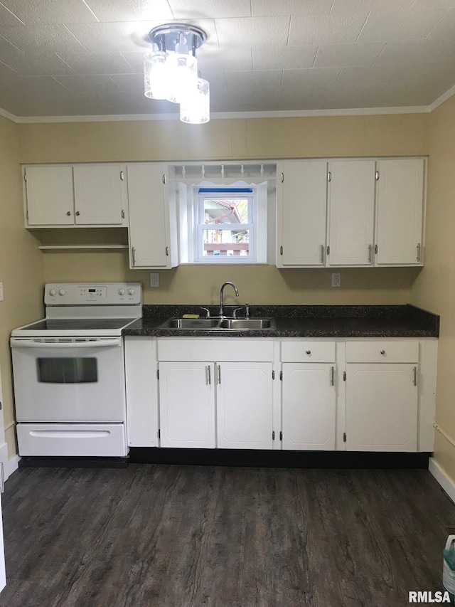 610 E Illinois Ave, Carterville, IL 62918 - kitchen with electric range, a sink, ornamental molding, white cabinetry, and dark wood finished floors