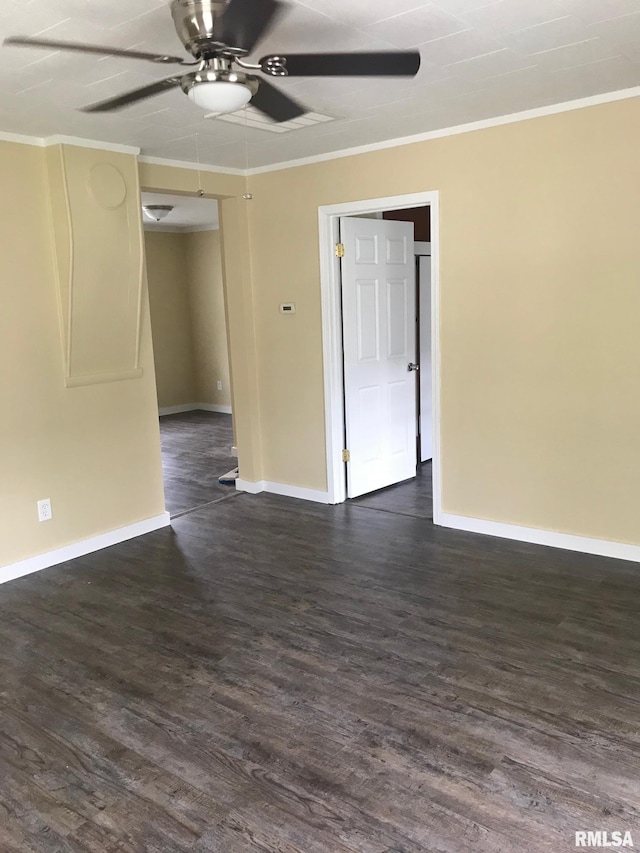 610 E Illinois Ave, Carterville, IL 62918 - spare room with a ceiling fan, baseboards, dark wood finished floors, and ornamental molding