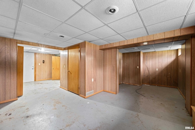 1206 10th Ave N, Clinton, IA 52732 - finished basement featuring a drop ceiling and wood walls