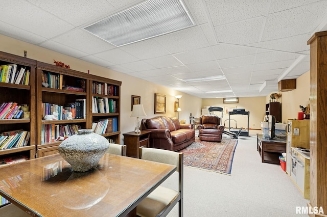 741 12th Ave N, Clinton, IA 52732 - carpeted dining area featuring a drop ceiling