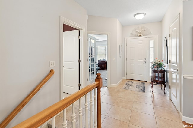 1361 Pinnacle Pines Ct, Bettendorf, IA 52722 - foyer entrance featuring baseboards and light tile patterned floors